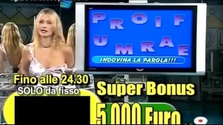 italian tv show : shame on lea di leo! her boobs fall out of her dress !