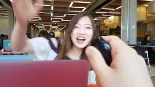 Cute asian girl with remote vibe outside